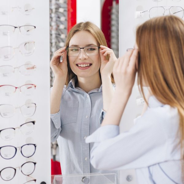 happy-woman-looking-new-glasses-optometrist+(1)