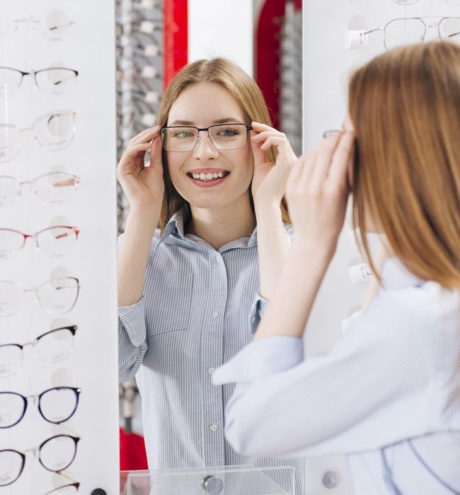 happy-woman-looking-new-glasses-optometrist1